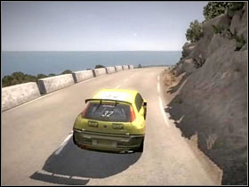 Tossa de Mar B: rocky wall on one of road margins and stony barriers on second. - Spain - Tracks - Colin McRae: DIRT - Game Guide and Walkthrough