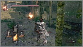 Keep going forwards but be careful, because after passing under an arch, an enemy with a spear will attack you from the right [1] - Undead Parish - p. 1 - Walkthrough - Dark Souls - Game Guide and Walkthrough