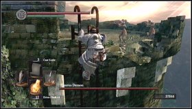 Before you start the fight, kill two soldiers on the tower behind you - Taurus Demon - How to kill a boss - Dark Souls - Game Guide and Walkthrough