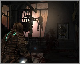 Through the cold storage window you can see bodies being changed into necromorphs - Dead Space Part 1 - Chapter 12: Dead Space - Dead Space - Game Guide and Walkthrough