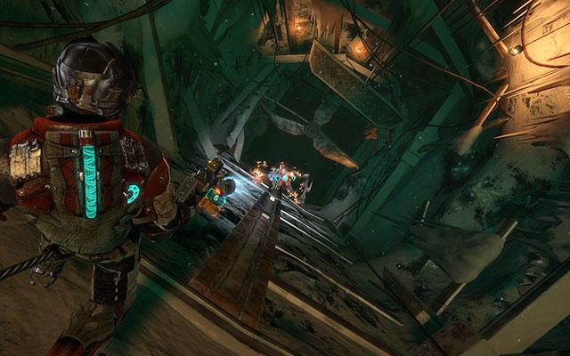 When you get to the bottom, you'll come across another monster fighting two Unitologists - Follow Danik down the Research Silo - 16: What Lies Below - Dead Space 3 - Game Guide and Walkthrough