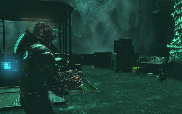 Near crates behind the elevator, after riding it up - Chapter 18 - Secrets - Dead Space 3 - Game Guide and Walkthrough