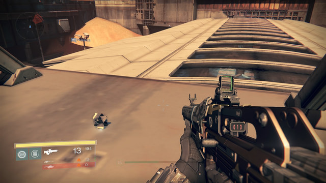 The Ghost lying by a billboard on the roof of the station entrance. - Mars - Dead Ghosts - Destiny - Game Guide and Walkthrough