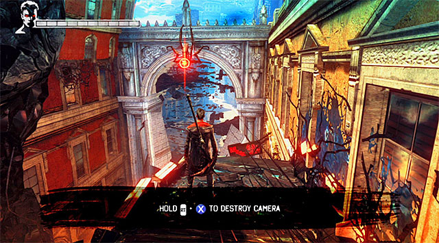 Jump onto the next platform and place yourself where the screen above shows - Destroying the first camera - 4: Under Watch - DMC: Devil May Cry - Game Guide and Walkthrough