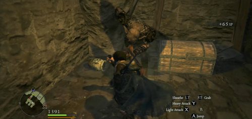 On the other side of the prison, take the lever from the chest - A Fortress Besieged - Act II - Dragons Dogma - Game Guide and Walkthrough