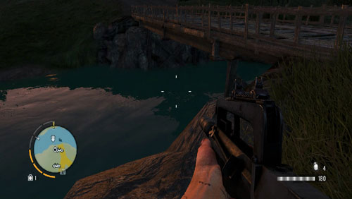 To find the statuette, dive on the left side of the bridge shown in the screenshot - The Southern Island - South-western part - Cult Objects - Far Cry 3 - Game Guide and Walkthrough