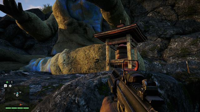 This wheel is located under right near a big statue - Southern and central Kyrat - Mani Wheels - Far Cry 4 - Game Guide and Walkthrough