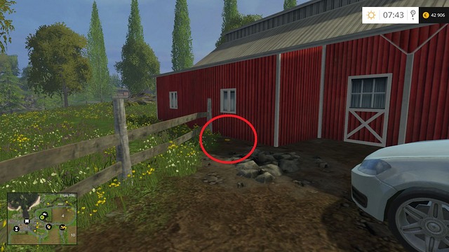 Near the wooden fence, behind the car - Section B - coins 13 - 29 - Gold coins - Farming Simulator 15 - Game Guide and Walkthrough
