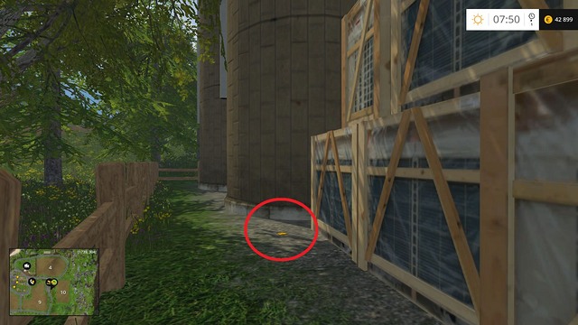 Behind the silos and some wooden crates - Section B - coins 13 - 29 - Gold coins - Farming Simulator 15 - Game Guide and Walkthrough
