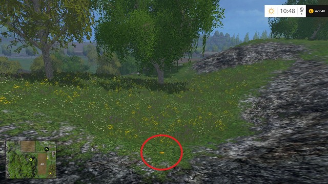 On the ground near some rocks - Section E - coins 55 - 69 - Gold coins - Farming Simulator 15 - Game Guide and Walkthrough