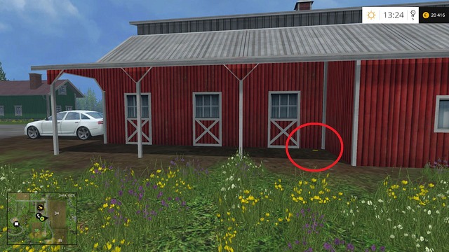 In the corner of a big red building - Section F - coins 70 - 89 - Gold coins - Farming Simulator 15 - Game Guide and Walkthrough