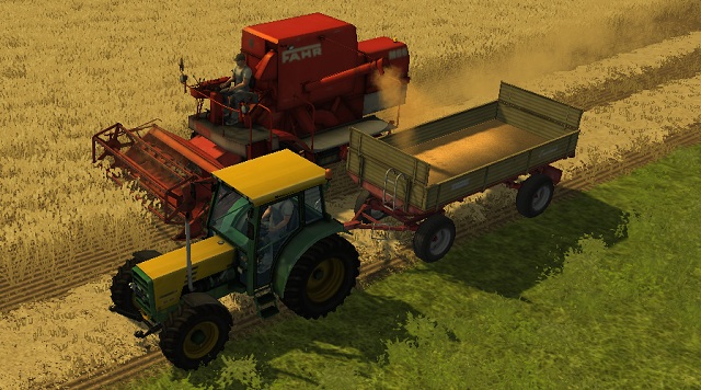 The worker is cutting the crops, while we are unloading the wheat. - Grains - Agriculture - Farming Simulator 2013 - Game Guide and Walkthrough