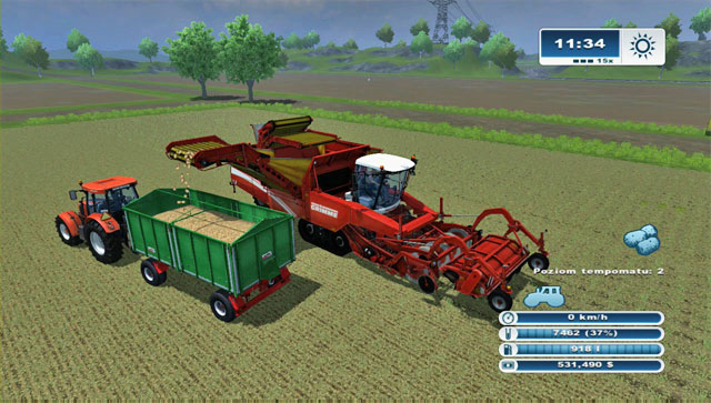 Unloading potatoes from a combine works just like with grains. - Growing potatoes - Agriculture - Farming Simulator 2013 - Game Guide and Walkthrough