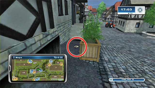 The horseshoe is in the town, hidden behind a wooden flower-pot in the northern row of buildings - Area E: horseshoes #45-#61 - Horseshoes - Farming Simulator 2013 - Game Guide and Walkthrough