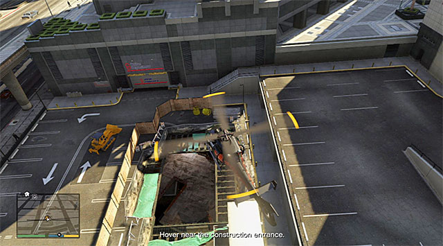Without waiting for Lester's instructions, fly behind the bank building right after you regain control over the chopper, and hover above the construction site shown in the screenshot - 58: Surveying the Score - Main missions - Grand Theft Auto V - Game Guide and Walkthrough