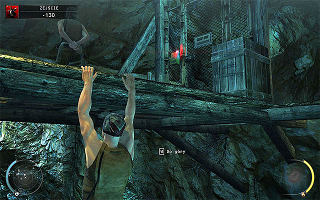 If you do not have a key card or you do not want to risk too much, a better idea is to move towards the edge of the bridge, descend and then move to the left or right in order to omit the gate - Descent - Getting into mines - 11: Dexter Industries - Hitman: Absolution - Game Guide and Walkthrough