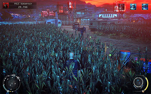 Proceed towards a large farmhouse seen in the distance, however make a stop near a trailer displayed on the screen above, because this is where Jaqueline Moorhead can be found - Cornfield - Murdering Jaqueline Moorhead - 14: Attack of the Saints - Hitman: Absolution - Game Guide and Walkthrough