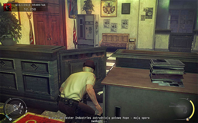 The exit from the county jail can be reached in two main ways: moving along the counter shown on the screen 1 to the right or heading to the door shown on the screen 2 (wait until recently bypassed cop walks to the left desk) - County jail - 16: Operation Sledgehammer - Hitman: Absolution - Game Guide and Walkthrough