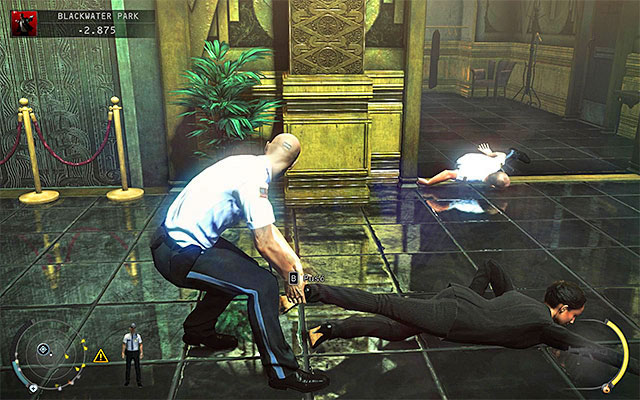 After initial clearing of the area quickly locate the security woman body and start dragging it - Blackwater Park - Unlocking access to the lift - 18: Blackwater Park - Hitman: Absolution - Game Guide and Walkthrough
