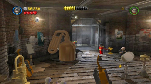 When you get to the basement destroy big gold instrument on the left (picture) where Riddler is hiding - Theatrical Pursuits - Walkthrough - LEGO Batman 2: DC Super Heroes - Game Guide and Walkthrough