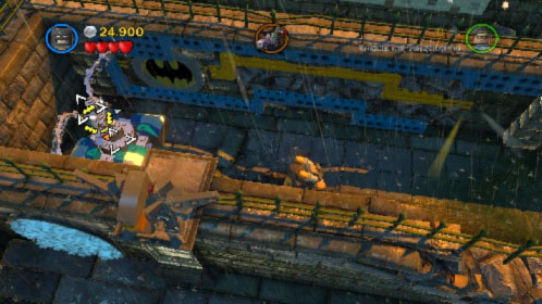 Move a little bit further to the left, destroy the silver statue (picture) and use bricks to build a platform - Arkham Asylum Antics - Walkthrough - LEGO Batman 2: DC Super Heroes - Game Guide and Walkthrough