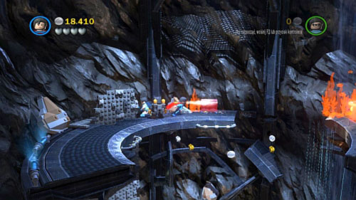 After a short animation with Joker move to the left, use bricks to build hole for the pole and jump on the little rock on the left - Unwelcome Guests - Walkthrough - LEGO Batman 2: DC Super Heroes - Game Guide and Walkthrough