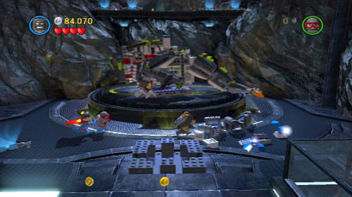 Use rockets to destroy all silver bricks near the platform with dinosaur and use remaining brick to build platform for trackball (picture) - Unwelcome Guests - Walkthrough - LEGO Batman 2: DC Super Heroes - Game Guide and Walkthrough