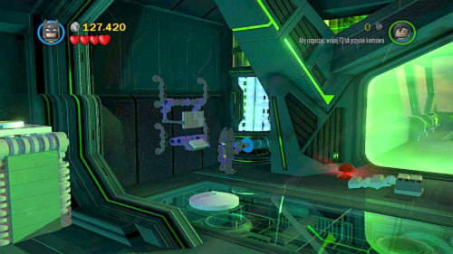 Take it and go to the blue wall on the left (picture) - Destination Metropolis - Walkthrough - LEGO Batman 2: DC Super Heroes - Game Guide and Walkthrough
