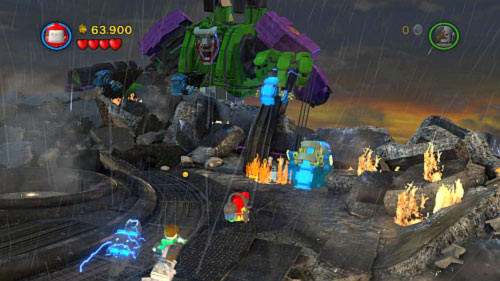 Move on the other side and extinguish fire near electric device on top (picture) - Tower Defiance - Walkthrough - LEGO Batman 2: DC Super Heroes - Game Guide and Walkthrough