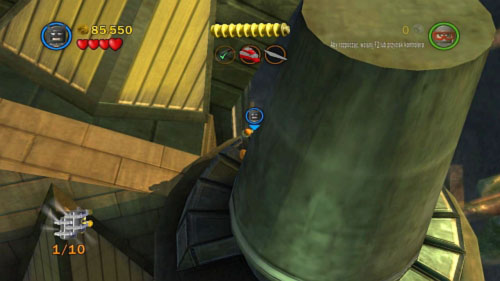 #06 - On the round pillar with the last part for the chopper - Harboring a Criminal - Minikits - LEGO Batman 2: DC Super Heroes - Game Guide and Walkthrough