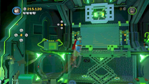 #03 - In the same location use Lex to destroy one of the black screens, move behind the fence, destroy black bricks and use both heroes to stand on the buttons (minikit will show under the ceiling) - Destination Metropolis - Minikits - LEGO Batman 2: DC Super Heroes - Game Guide and Walkthrough