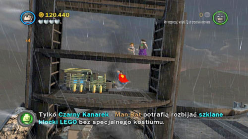 #09 - On the plaza near robot, fly on the metal construction on the left and destroy two crates - Tower Defiance - Minikits - LEGO Batman 2: DC Super Heroes - Game Guide and Walkthrough