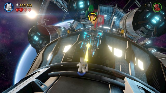 As soon as a rocket hits the space station, switch characters to Batman, and use his Space Suit to cut through the gold object - Space Suits You, Sir! - Walkthrough - LEGO Batman 3: Beyond Gotham - Game Guide and Walkthrough