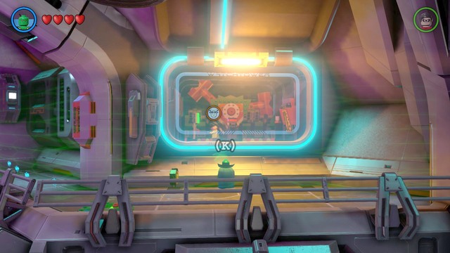 As soon as you get on the other side of the field, you will notice a glass pane, and a bandit behind it - Space Station Infestation - Walkthrough - LEGO Batman 3: Beyond Gotham - Game Guide and Walkthrough