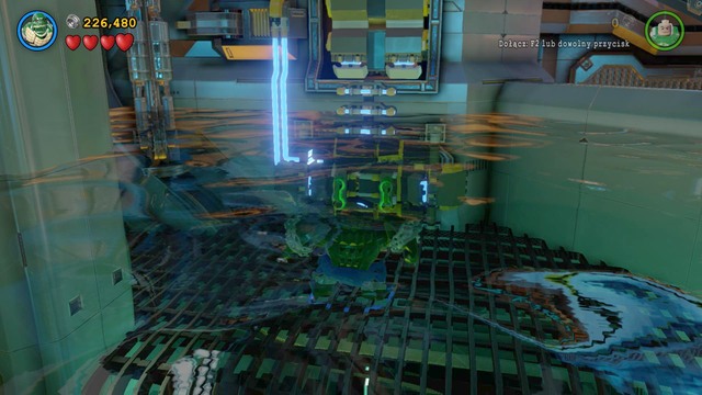 After getting through the door, head toward the green wall as Batman, and align the bricks there in a line in the center - Space Station Infestation - Walkthrough - LEGO Batman 3: Beyond Gotham - Game Guide and Walkthrough