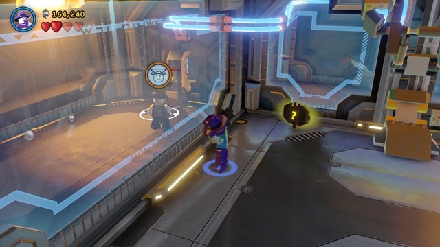 After putting on the Flower Suit, approach the glass on the left and mind control the worker on the other side - Space Station Infestation - Walkthrough - LEGO Batman 3: Beyond Gotham - Game Guide and Walkthrough