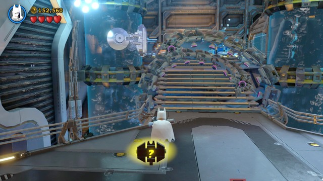 Once you have collected the suit as Batman, put on the Power Suit and fire a missile at the silver object on the left water tank - Space Station Infestation - Walkthrough - LEGO Batman 3: Beyond Gotham - Game Guide and Walkthrough
