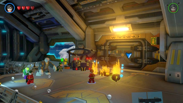 When you get to the next area, use the elevator on the right as Batman and wear the Arctic Suit - The Lantern Menace - Walkthrough - LEGO Batman 3: Beyond Gotham - Game Guide and Walkthrough