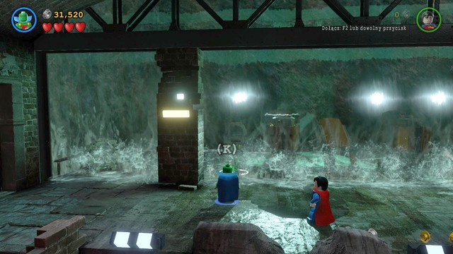 The third Minikit is located above the fire trap and the switches - Minikits - Pursuers in the Sewers - secrets - LEGO Batman 3: Beyond Gotham - Game Guide and Walkthrough
