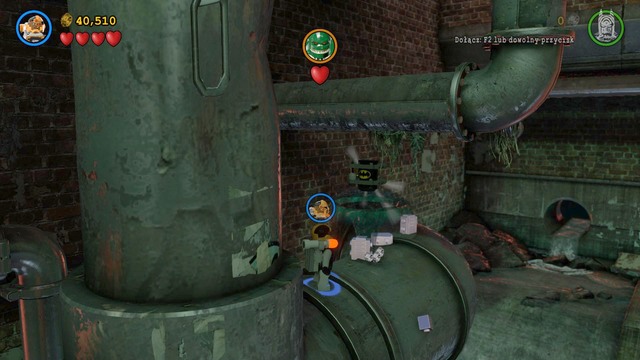 You can obtain the last, tenth, Minikit by flying onto a pipe located to the right of Killer Croc - Minikits - Pursuers in the Sewers - secrets - LEGO Batman 3: Beyond Gotham - Game Guide and Walkthrough