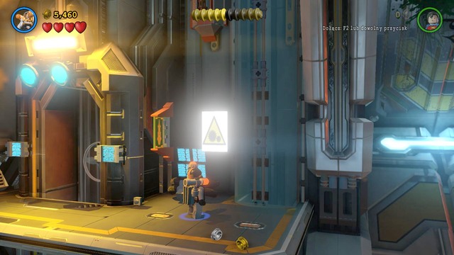 To unlock the third Minikit, you have to find five glowing posters with a warning sign (shown in the picture) - Minikits - Space Station Infestation - secrets - LEGO Batman 3: Beyond Gotham - Game Guide and Walkthrough