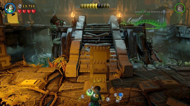 You will find the third character in the main cave - Characters - Need for Greed - secrets - LEGO Batman 3: Beyond Gotham - Game Guide and Walkthrough