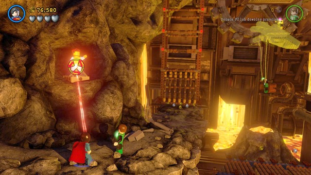 In the part where you fall down and escape Sinestro, you will find a gold statue in a cave - Minikits - Aw-Qward Situation - secrets - LEGO Batman 3: Beyond Gotham - Game Guide and Walkthrough