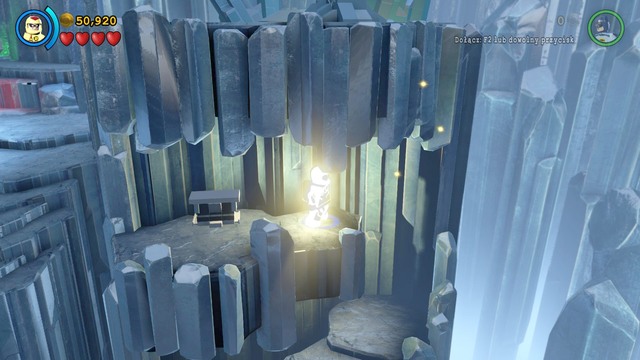 Enter the cave, lighting your way and find a Minikit at the bottom, - Minikits - Breaking the Ice - secrets - LEGO Batman 3: Beyond Gotham - Game Guide and Walkthrough