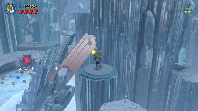 Jump onto a rock in the central part of the cave and destroy the crystal shown in the picture, using Cyborgs Demolition Suit - Minikits - Breaking the Ice - secrets - LEGO Batman 3: Beyond Gotham - Game Guide and Walkthrough
