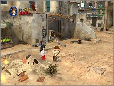 Go down, and you will reach a stand with a bananas and a monkey - Chapter 3 - City of Danger - part 1 - Riders of the Lost Ark - LEGO Indiana Jones: The Original Adventures - Game Guide and Walkthrough