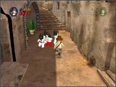 You will be immediately attacked by enemies with swords - Chapter 3 - City of Danger - part 1 - Riders of the Lost Ark - LEGO Indiana Jones: The Original Adventures - Game Guide and Walkthrough