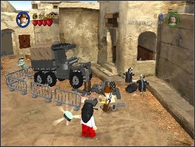 On the other side defeat your enemies and repair the truck using LEGO pieces - Chapter 3 - City of Danger - part 2 - Riders of the Lost Ark - LEGO Indiana Jones: The Original Adventures - Game Guide and Walkthrough