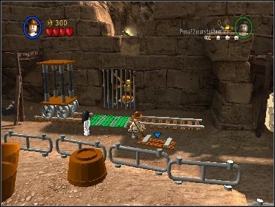 Almost immediately you will be attacked by enemies - Chapter 5 - Pursuing the Ark - Riders of the Lost Ark - LEGO Indiana Jones: The Original Adventures - Game Guide and Walkthrough