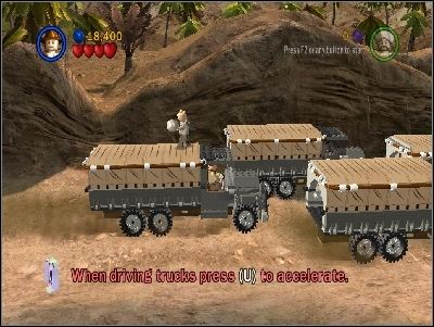 You will start on the roof of the truck - Chapter 5 - Pursuing the Ark - Riders of the Lost Ark - LEGO Indiana Jones: The Original Adventures - Game Guide and Walkthrough